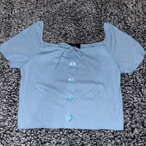 Blue bow top with adjustable string